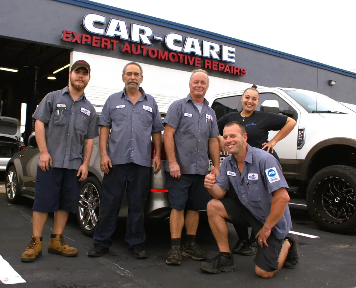 The Jupiter Car-Care team standing in front of the shop on Toney Penna Drive in Jupiter